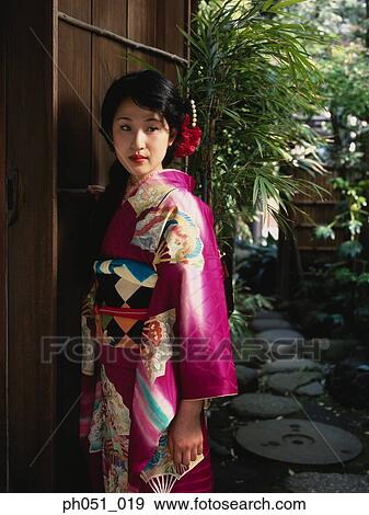 Woman in Japanese garden, portrait View Large Photo Image Stock Photo - Woman in Japanese garden, portrait. Fotosearch