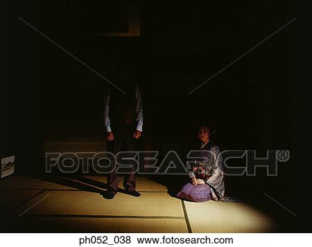 Stock Photo - Traditional Japanese couple, indoor. Fotosearch