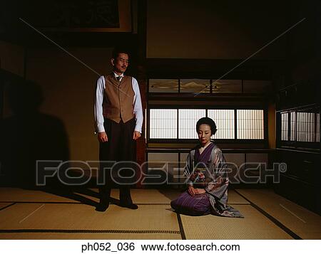 Stock Photograph - Traditional Japanese couple, indoor. Fotosearch
