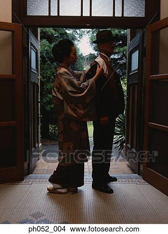 Traditional Japanese couple, indoors View Large Photo Image Picture - Traditional Japanese couple, indoors. Fotosearch