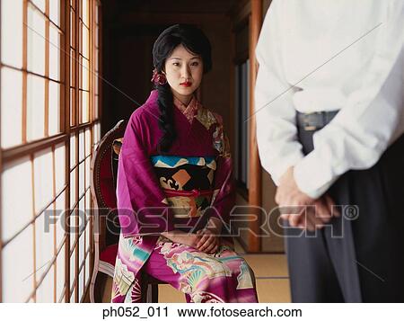 Stock Image - Traditional Japanese couple. Fotosearch