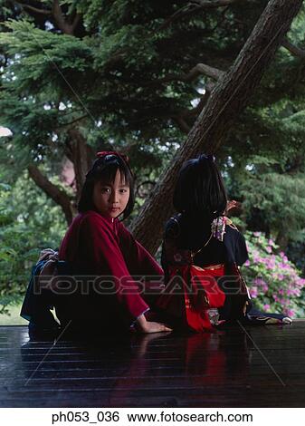 Stock Photograph - Young girls in Kimono, portrait. Fotosearch