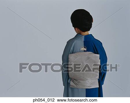 Stock Image - Japanese woman in kimono, rear view . Fotosearch