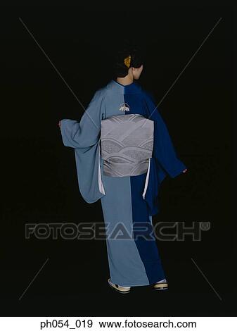 Stock Photo - Japanese woman in kimono, rear view . Fotosearch