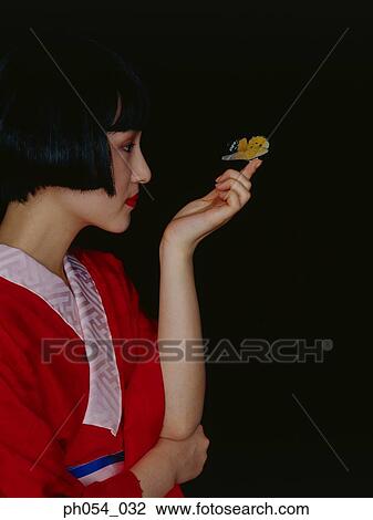 Japanese woman in kimono, side view View Large Photo Image Stock Image - Japanese woman in kimono, side view. Fotosearch