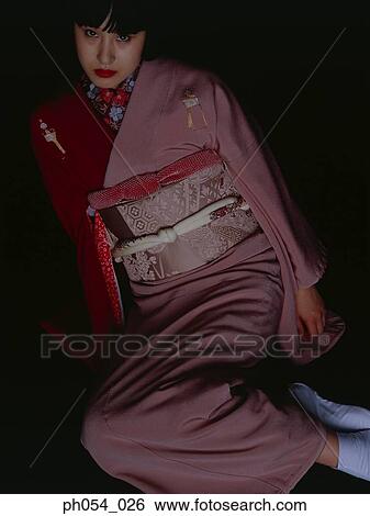 Japanese woman in kimono sitting on floor View Large Photo Image Stock Photograph - Japanese woman in kimono sitting on floor. Fotosearch