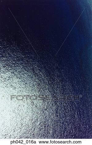 Aerial of waves in ocean water View Large Photo Image Stock Image - Aerial of waves in ocean water. Fotosearch