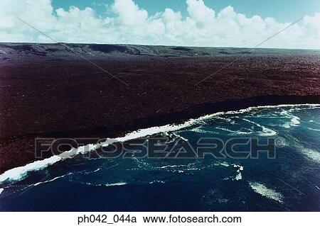 Aerial view of volcanic landscape and coast, Big Island, Hawaii View Large Photo Image Stock Image - Aerial view of volcanic landscape and coast, Big Island, Hawaii. Fotosearch