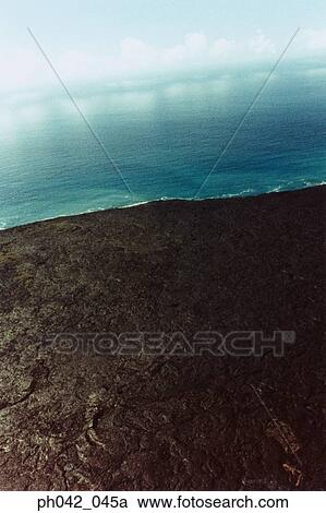 Aerial view of volcanic landscape and coast, Big Island, Hawaii View Large Photo Image Stock Image - Aerial view of volcanic landscape and coast, Big Island, Hawaii. Fotosearch