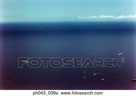 Stock Image - Motor boats on ocean, aerial view, Hawaii, USA . Fotosearch