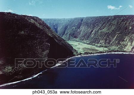 Stock Image - USA, Hawaii, Big Island, cliff and coast scenic . Fotosearch