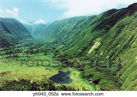 Stock Image - USA, Hawaii, Big Island, Steep cliffs . Fotosearch