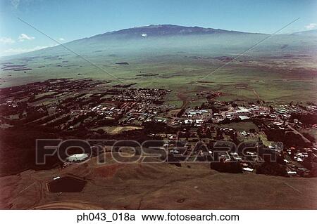 Stock Image - Valley Town, Big Island, Hawaii, aerial view. Fotosearch