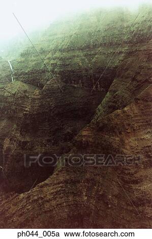 Stock Image - Aerial view of a rocky mountain range, Kauai, Hawaii. Fotosearch