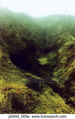 Stock Image - Aerial view of rolling mountains, Kauai, Hawaii. Fotosearch