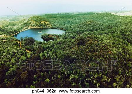 Lake in lush green landscape, Kauai, Hawaii, aerial view View Large Photo Image Stock Image - Lake in lush green landscape, Kauai, Hawaii, aerial view. Fotosearch