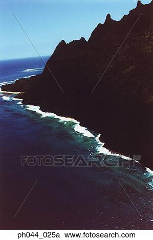 Stock Image - USA, Hawaii, Kauai, mountainous coastline, aerial view. Fotosearch