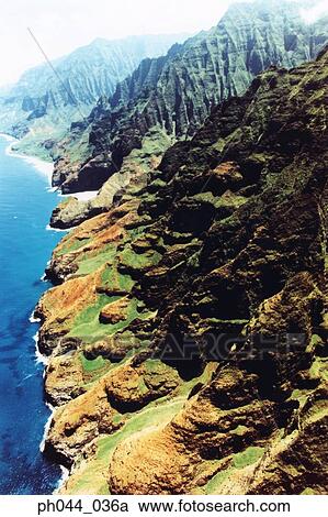 Stock Image - USA, Hawaii, Kauai, mountainous coastline, aerial view. Fotosearch