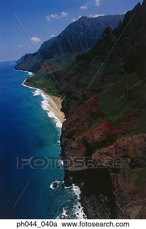 Stock Image - USA, Hawaii, Kauai, mountainous coastline, aerial view. Fotosearch