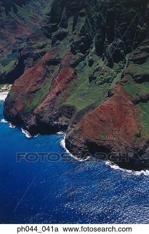 Stock Image - USA, Hawaii, Kauai, mountainous coastline, aerial view. Fotosearch