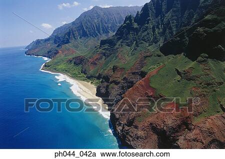 Stock Image - USA, Hawaii, Kauai, mountainous coastline, aerial view. Fotosearch