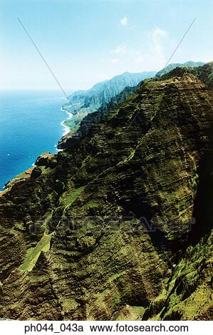 Stock Image - USA, Hawaii, Kauai, mountainous coastline, aerial view. Fotosearch