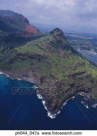 Stock Image - USA, Hawaii, Kauai, mountainous coastline, aerial view. Fotosearch