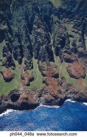 Stock Image - USA, Hawaii, Kauai, mountainous coastline, aerial view. Fotosearch