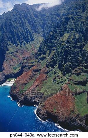 Stock Image - USA, Hawaii, Kauai, mountainous coastline, aerial view. Fotosearch