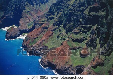 Stock Image - USA, Hawaii, Kauai, mountainous coastline, aerial view. Fotosearch