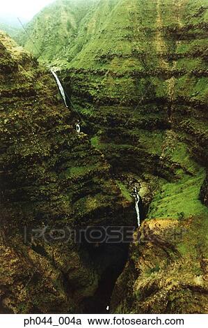 USA, Hawaii, Kauai, Waterfall and lush hillside View Large Photo Image Stock Image - USA, Hawaii, Kauai, Waterfall and lush hillside . Fotosearch