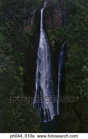 USA, Hawaii, Kauai, Waterfall and lush hillside View Large Photo Image Stock Image - USA, Hawaii, Kauai, Waterfall and lush hillside . Fotosearch