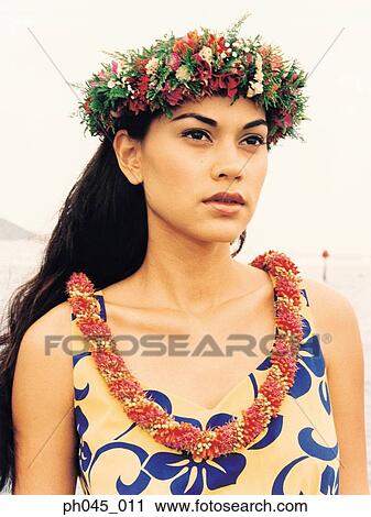 Hawaiian female wearing traditional hula attire. View Large Photo Image Stock Image - Hawaiian female wearing traditional hula attire. . Fotosearch