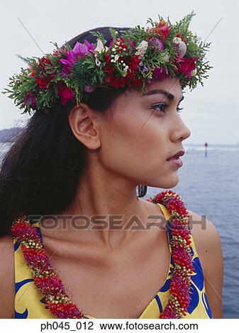 Hawaiian female wearing traditional hula attire. View Large Photo Image Stock Image - Hawaiian female wearing traditional hula attire. . Fotosearch
