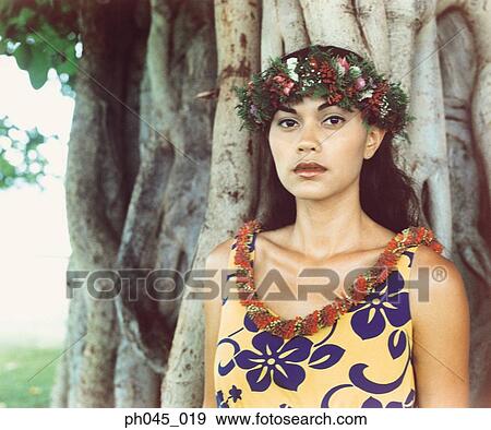 Hawaiian female wearing traditional hula attire. View Large Photo Image Stock Photo - Hawaiian female wearing traditional hula attire. . Fotosearch