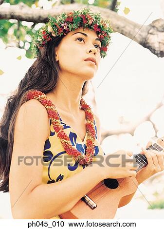 Hula Dancer Playing Ukelele View Large Photo Image Stock Image - Hula Dancer Playing Ukelele . Fotosearch
