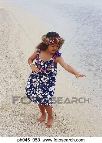 Little hula girl dancing at a beach View Large Photo Image Stock Photo - Little hula girl dancing at a beach. Fotosearch