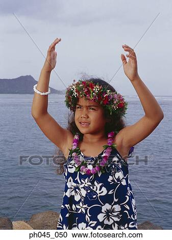 Little hula girl dancing near ocean View Large Photo Image Stock Image - Little hula girl dancing near ocean. Fotosearch