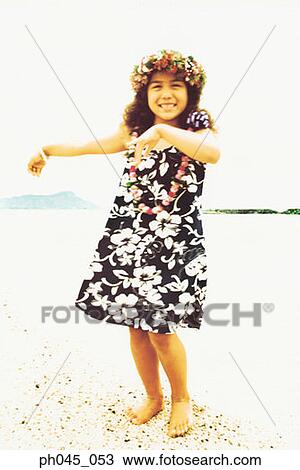 Little hula girl dancing near ocean View Large Photo Image Stock Image - Little hula girl dancing near ocean. Fotosearch