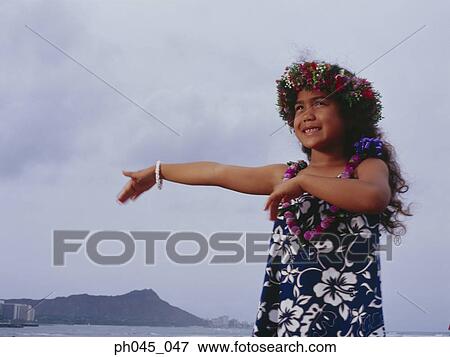 Little hula girl dancing near ocean View Large Photo Image Stock Photo - Little hula girl dancing near ocean. Fotosearch