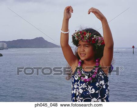 Little hula girl dancing near ocean View Large Photo Image Stock Photo - Little hula girl dancing near ocean. Fotosearch