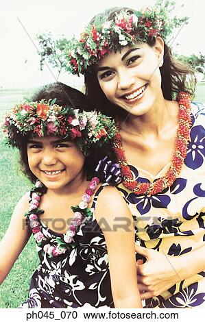 Two sisters wearing traditional hula dancing outfits View Large Photo Image Stock Image - Two sisters wearing traditional hula dancing outfits . Fotosearch