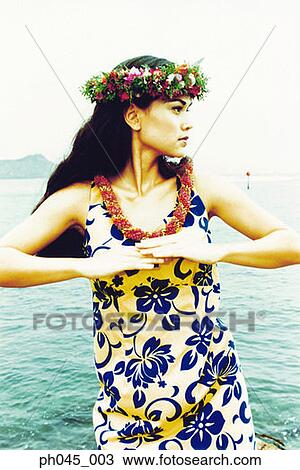 USA, Hawaii, female hula dancer performing near ocean View Large Photo Image Stock Image - USA, Hawaii, female hula dancer performing near ocean . Fotosearch