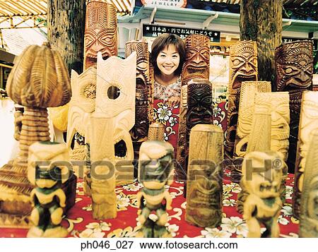 Young woman and Hawaiian handicraft View Large Photo Image Stock Photo - Young woman and Hawaiian handicraft. Fotosearch