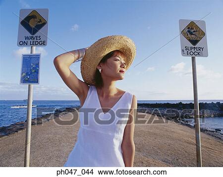 Young woman in straw hat, portrait View Large Photo Image Picture - Young woman in straw hat, portrait. Fotosearch