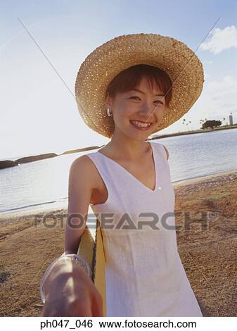 Young woman in straw hat, portrait View Large Photo Image Stock Photograph - Young woman in straw hat, portrait. Fotosearch