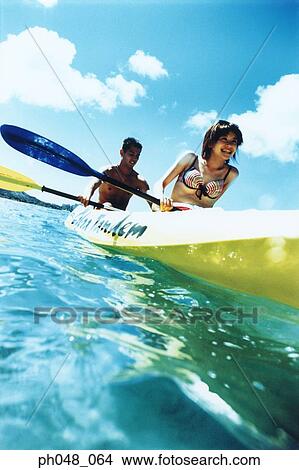 Young couple Kayaking View Large Photo Image Picture - Young couple Kayaking . Fotosearch