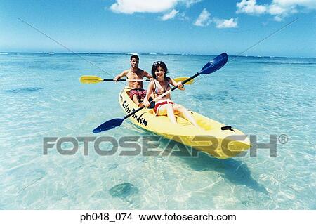 Picture - Young couple Kayaking . Fotosearch