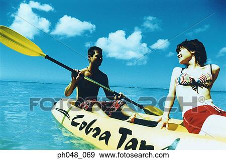 Young couple Kayaking View Large Photo Image Stock Photo - Young couple Kayaking . Fotosearch