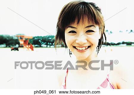 Portrait of young woman in bikini, close up View Large Photo Image Stock Image - Portrait of young woman in bikini, close up. Fotosearch